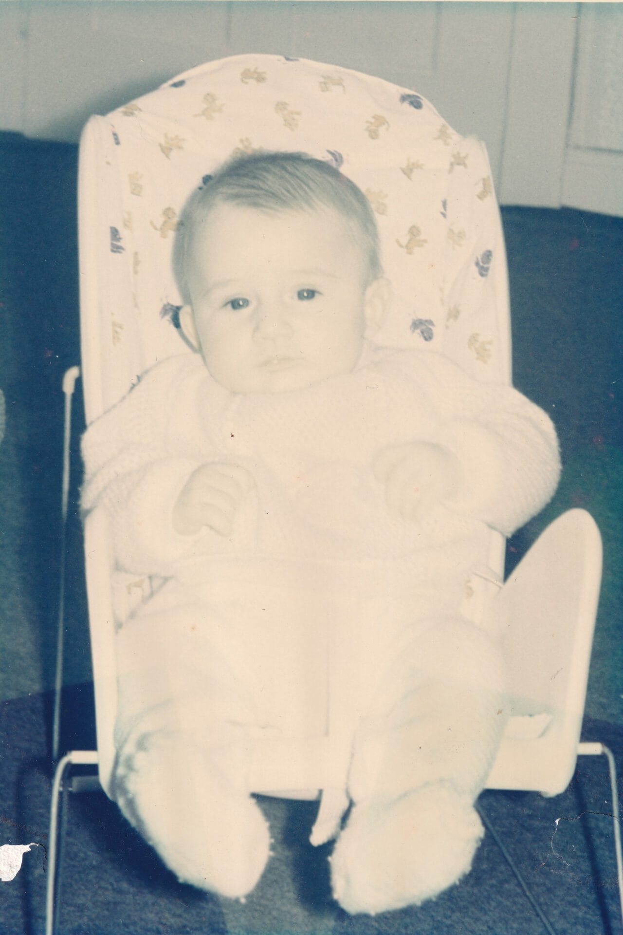 Photo d'un bébé dans un transat - Avant restauration du Studio Salvucci, Photographe Metz